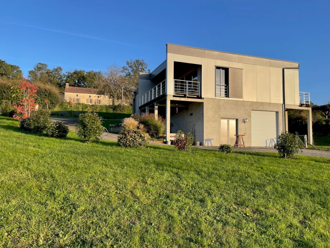 MAISON MODERNE DE PLAIN-PIED DE 4 PIÈCES 140 M2 - Photo 3 - Loubejac
