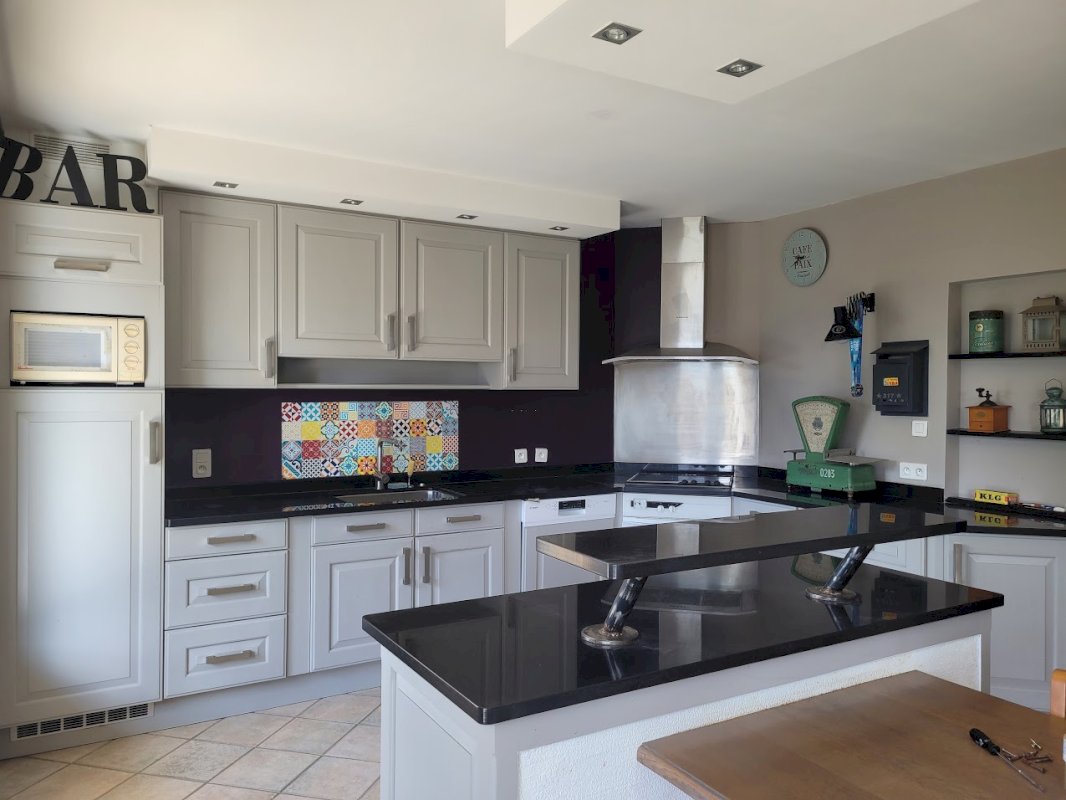 Maison familiale lumineuse / 132 m² / 4 chambres / Terrain 728 m² - Photo 3 - Tonneins